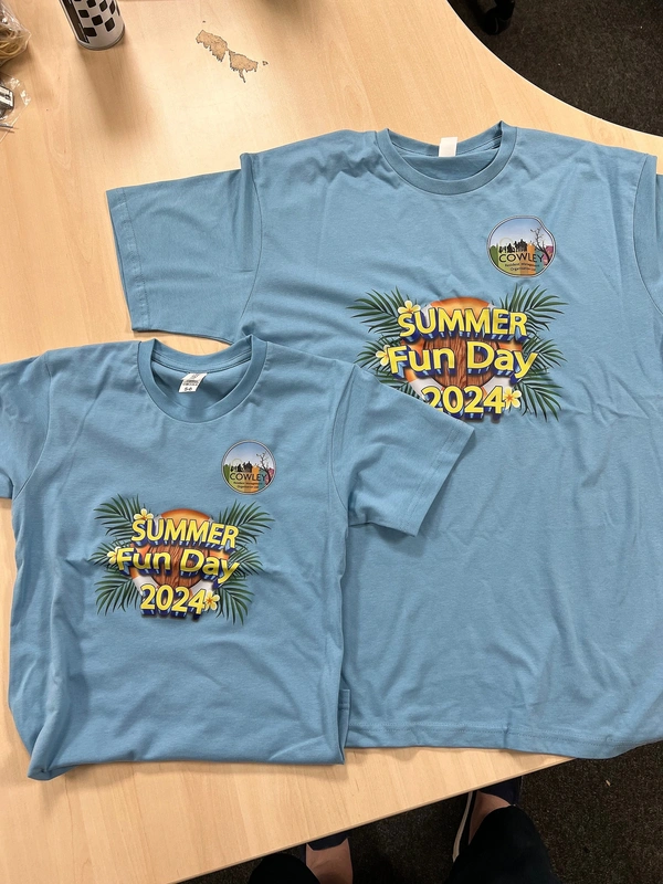 Adult and child custom printed t-shirts for Cowley Summer Fun Day 2024 - full-colour DTG event t-shirts delivered across London and Essex by Furnival Press